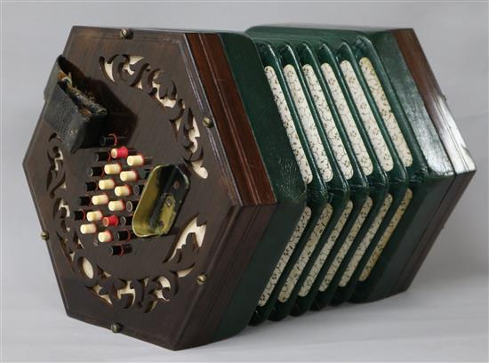 A Victorian rosewood concertina with twenty four ivory and coloured keys to each side 17cm